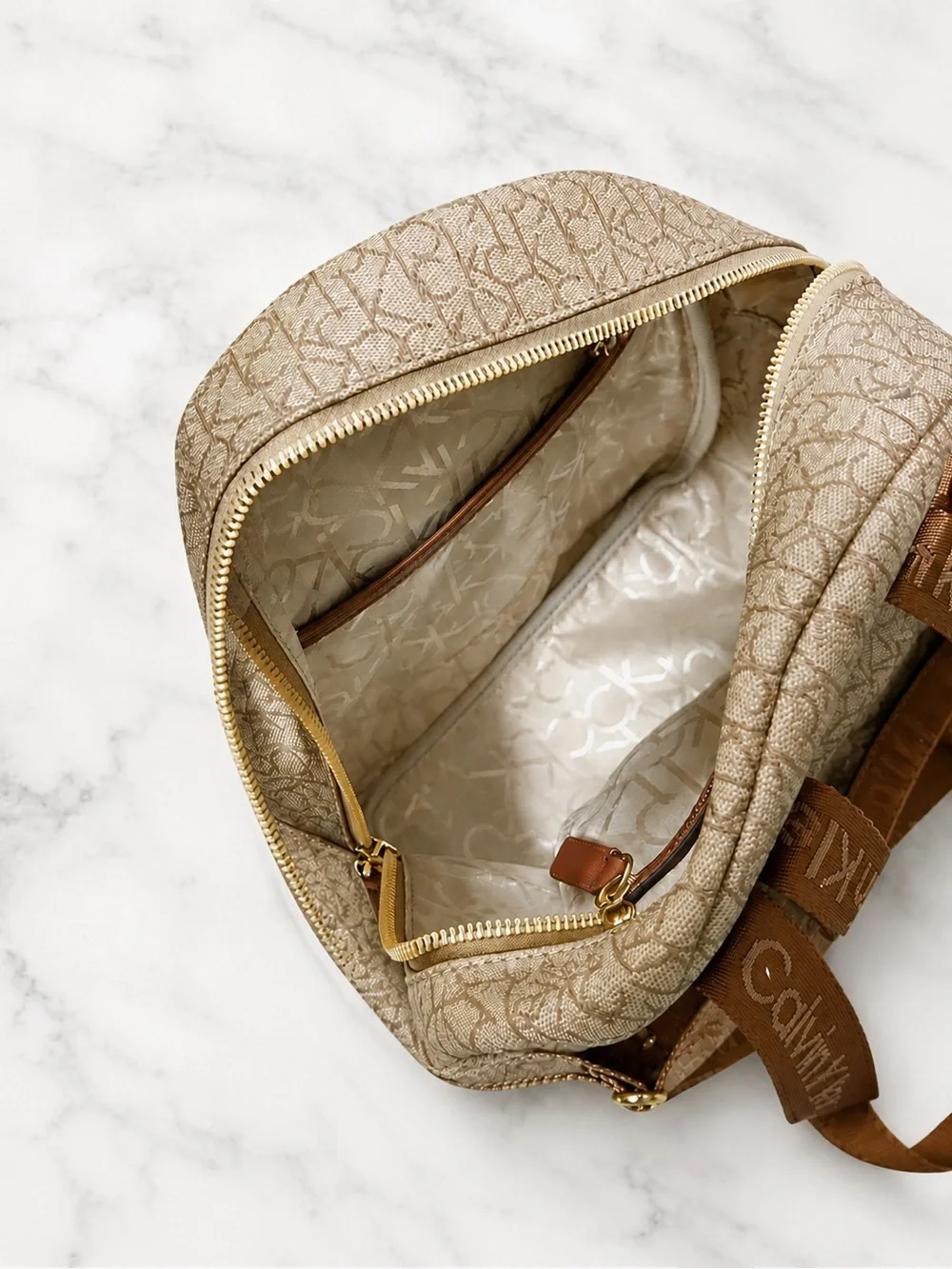 Calvin Klein Beige Monogram Mini Backpack with Brown Trim